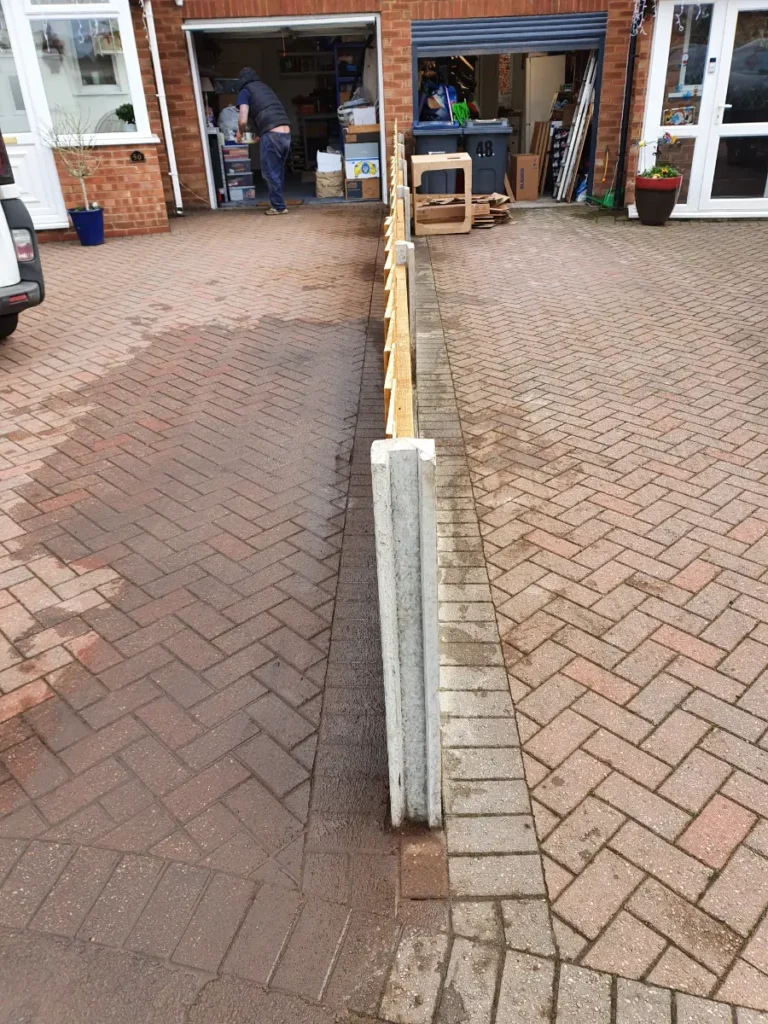 Driveway Fencing Installation with Concrete Posts and Gravel Boards 7 Driveway Fencing Installation with Concrete Posts and Gravel Boards